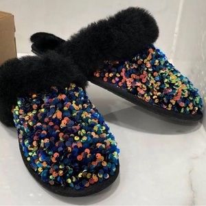These are the UGG multi-sparkle fur slip ons in excellent condition.